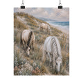 Three graceful horses graze among coastal dunes overlooking the sea in this serene equestrian artwork featuring soft neutral tones, textured details, and timeless seaside beauty.