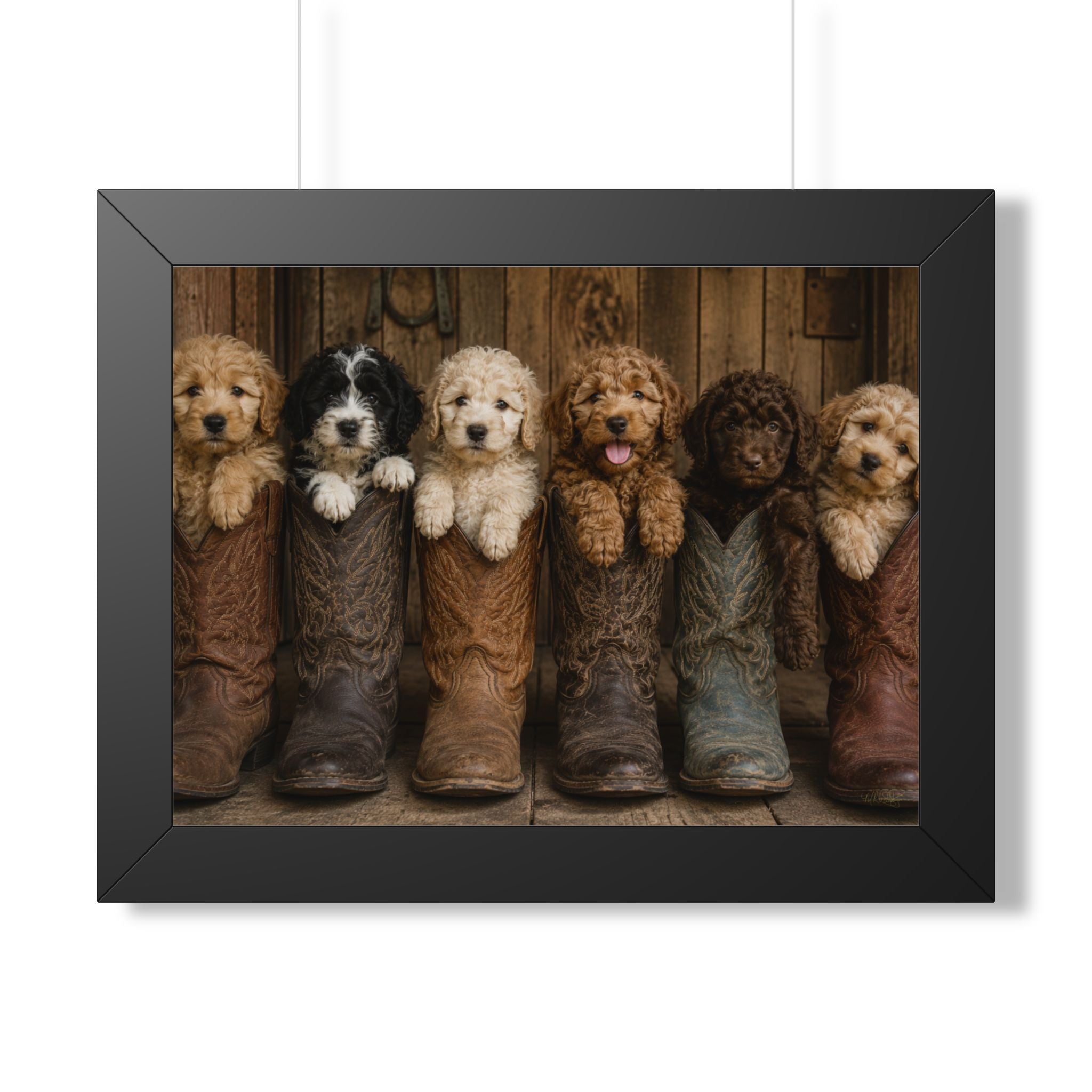 Black Framed - Six adorable puppies nestled inside weathered cowboy boots create a heartwarming blend of Western charm, playful personalities, and rustic farmhouse style.