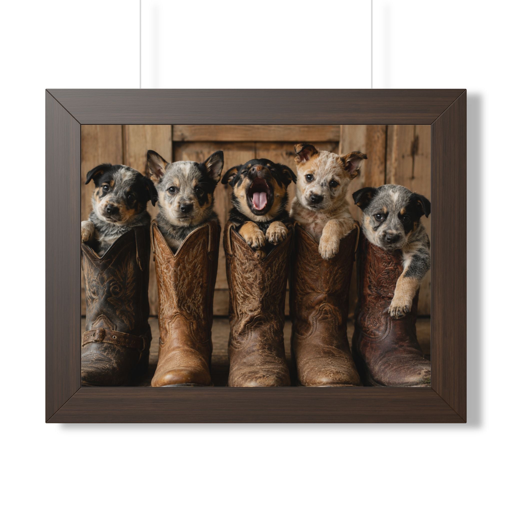 Brown Frame - Adorable puppies peeking from weathered cowboy boots create a heartwarming blend of Western charm, playful personalities, and rustic farmhouse style.